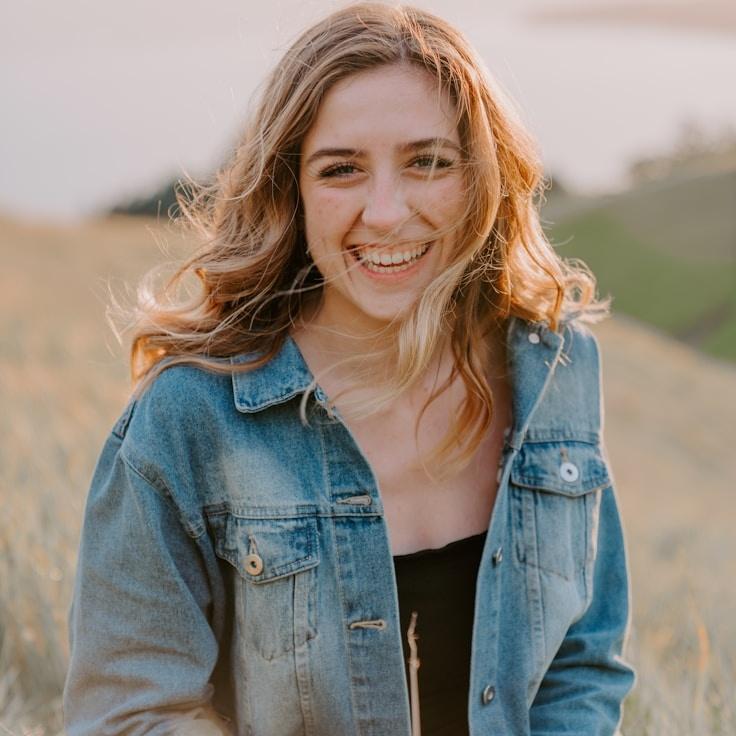 Kaveri Mehta, Lead Design Curator at GrovePixelHarbor, reviewing corporate floral arrangements